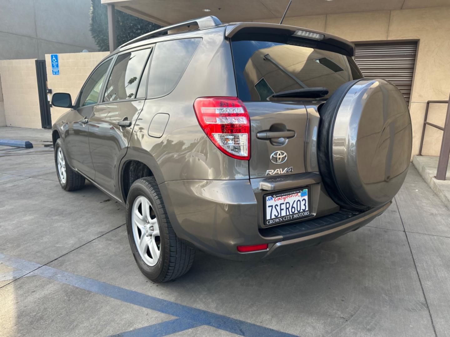 2012 Gray Toyota RAV4 Base I4 2WD with 3rd Row (2T3KF4DVXCW) with an 2.4L L4 DOHC 16V engine, 4-Speed Automatic transmission, located at 30 S. Berkeley Avenue, Pasadena, CA, 91107, (626) 248-7567, 34.145447, -118.109398 - Crown City Motors is a used “Buy Here Pay Here” car dealer in Pasadena CA. “Buy Here Pay Here” financing, means that when you purchase your vehicle from our dealership, that you make the payments to the dealership as well. We do not need the banks approval to get you approved for a used auto - Photo#3